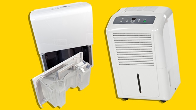 two dehumidifiers on yellow background